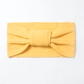 Detail of a bright yellow elastic nylon headband for babies with jacquard knit knot - Khaki/Earth Yellow