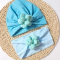 Detail of sky blue cotton baby turban hat and headband with mint green fabric flowers - Blue