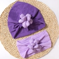 Detail von Baby-Blumen-Turban und Stirnband-Set mit 3D-Stoffblumen auf Strohmatte - Lila