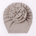 Ribbed baby turban hat with a large pleated flower in soft champagne knit fabric - Gray
