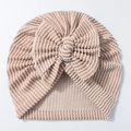 Detailed view of striped newborn turban hat with soft fabric and large bow accessory - Light Coffee