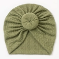 Detailed knit texture of olive green baby turban hat with a decorative donut knot - Green
