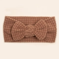 Brown waffle knit baby headband featuring a large bow on a soft elastic hair band - Coffee