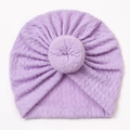 Macro detail of lavender knit baby turban with donut knot and decorative cable texture - Purple
