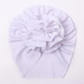 White ribbed baby beanie featuring a large layered fabric flower and soft elastic knit - White