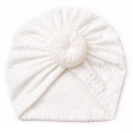 Close-up of soft white knitted baby turban with donut knot and detailed rib texture - White