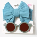 Detail view of baby headband and sunglasses set with blue bow and dark green frames - Navy Blue