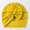 Close-up of bright yellow newborn turban hat featuring a textured wave rib fabric bow - Yellow