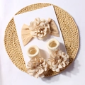 Detailed close-up of baby headband and socks set with elegant floral jacquard design - Beige Coffee And Beige Socks