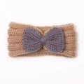 Detail of baby knitted headband featuring a contrast gray bow on khaki textured wool - Coffee + Gray