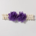 Detail of baby lace headband featuring purple chiffon flowers and creamy elastic mesh lace - Deep purple