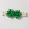 Detailed view of handmade lace baby headband with emerald green chiffon flower petals - Green