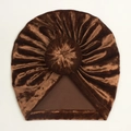 Detailed top view of a soft brown velvet baby turban hat with a twisted donut knot decoration - Brown