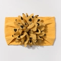 Detailed close-up of yellow jacquard nylon baby headband with large heart print floral bow - Earthy Yellow