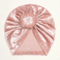 Macro shot of soft pink velvet baby turban hat with a signature donut knot detail - Dusky Pink