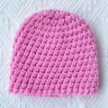 Pink chunky knit beanie for infants and toddlers with warm crochet texture and round crown - Pink