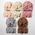 Flat lay of baby plush bow turban hats and headbands set in five soft autumn colors - Mixed Colors