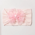 Detailed macro view of pink ribbed baby headband with embroidered lace mesh bow design - Light Pink