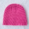 Detail of rose pink chunky knit baby beanie with textured crochet pattern for warmth - Rose Red