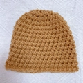 Thick knitted baby beanie in caramel brown with honeycomb texture for winter warmth - Coffee