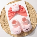 Detail of coral pink baby turban and matching ribbed socks with plush cartoon animal decor - Pink