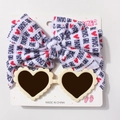 Détail de lunettes coeur crème et bandeau avec nœud MAMA'S GIRL pour bébés filles - Lettres Cœur Blanc Cassé (K)
