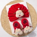 Detail of red knit baby hat and socks set with 3D plush Christmas reindeer doll accents - Red Reindeer Style C
