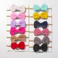 Set of twelve elastic knitted bow headbands for babies in assorted vibrant solid colors - 12 Colors Mixed