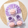 Detail of purple knit baby set featuring a 3D cartoon bee design on hat and socks - Purple