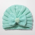 Detailed knit texture of mint green baby hat with bow and decorative pom-pom - Mint Green