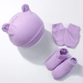 Detailed view of purple knitted baby set with bear ears hat, mittens and socks - Purple