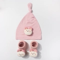 Close-up of soft pink modal knit baby hat and socks set with 3D teddy bear patches - Dark Mauve