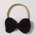 Close-up of handmade crochet bow hairband with elastic nylon string in black color - Black