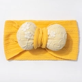 Detail of baby yellow jacquard headband with embroidered flower bow and cable knit texture - Khaki/Earth Yellow