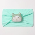 Détail du bandeau élastique vert menthe pour bébé avec un joli patch de chat en 3D - Vert menthe
