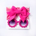Detail van babyhoofdband met strik en roze madeliefje zonnebril accessoireset - Rozerood