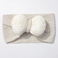 Detail of baby headband featuring soft cream knit fabric and lace floral bow decoration - Gray
