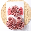 Detail view of salmon pink baby headband and socks set with 3D floral heart patterns - Dark Mauve
