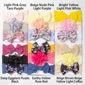 Detailed close-up of nylon baby headbands with assorted bows and floral designs - Mixed Colors