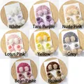 Vue détaillée de 8 ensembles de bandeaux et chaussettes en dentelle pour bébé en coton - Ensemble Bonnet et Chaussettes / Ensemble multicolore
