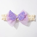 Detail of baby lace headband featuring a double-layer purple bow and sequin wings - Purple