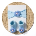 Detail showing baby headband and socks set with 3D floral accents in light blue - Blue
