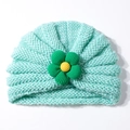 Dettaglio della trama a maglia del cappello a turbante verde menta per neonati - Verde menta