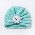 Detail of baby turban hat showing the lake blue knit texture and cute bear embroidery - Mint Green