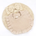 Detail of soft muslin baby bib with ruffles and matching bow headband in beige - Coffee And Beige