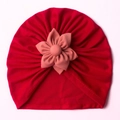 Red baby turban hat with a pink fabric flower decoration for winter warmth - Red