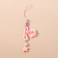 Detailed macro view of pink bow, cloud charm and star pendant on cute fashion keychain - Star Cloud Phone Charm