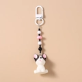 Detail of the French Bulldog resin charm with colorful beads and white lobster clasp - White