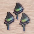 Colorful acrylic butterfly wing pendants for DIY jewelry making on wooden background - 10 Pieces Pack / Green