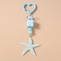 Detail of blue starfish pendant keychain with glitter resin star and heart clip - Starfish Shape / Light Blue